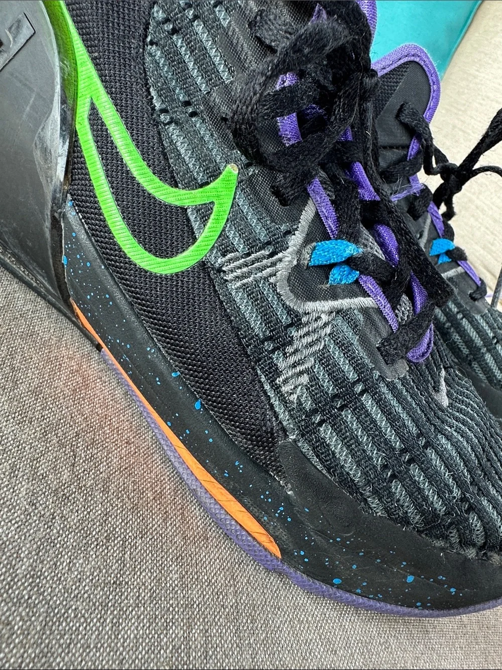 Nike Black Sneakers with Purple Lining and Green Swoosh